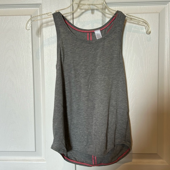 Worn 1X, Ivivva, girls, loose fit tank, shirttail hi-low hem, cut out back - Picture 1 of 6